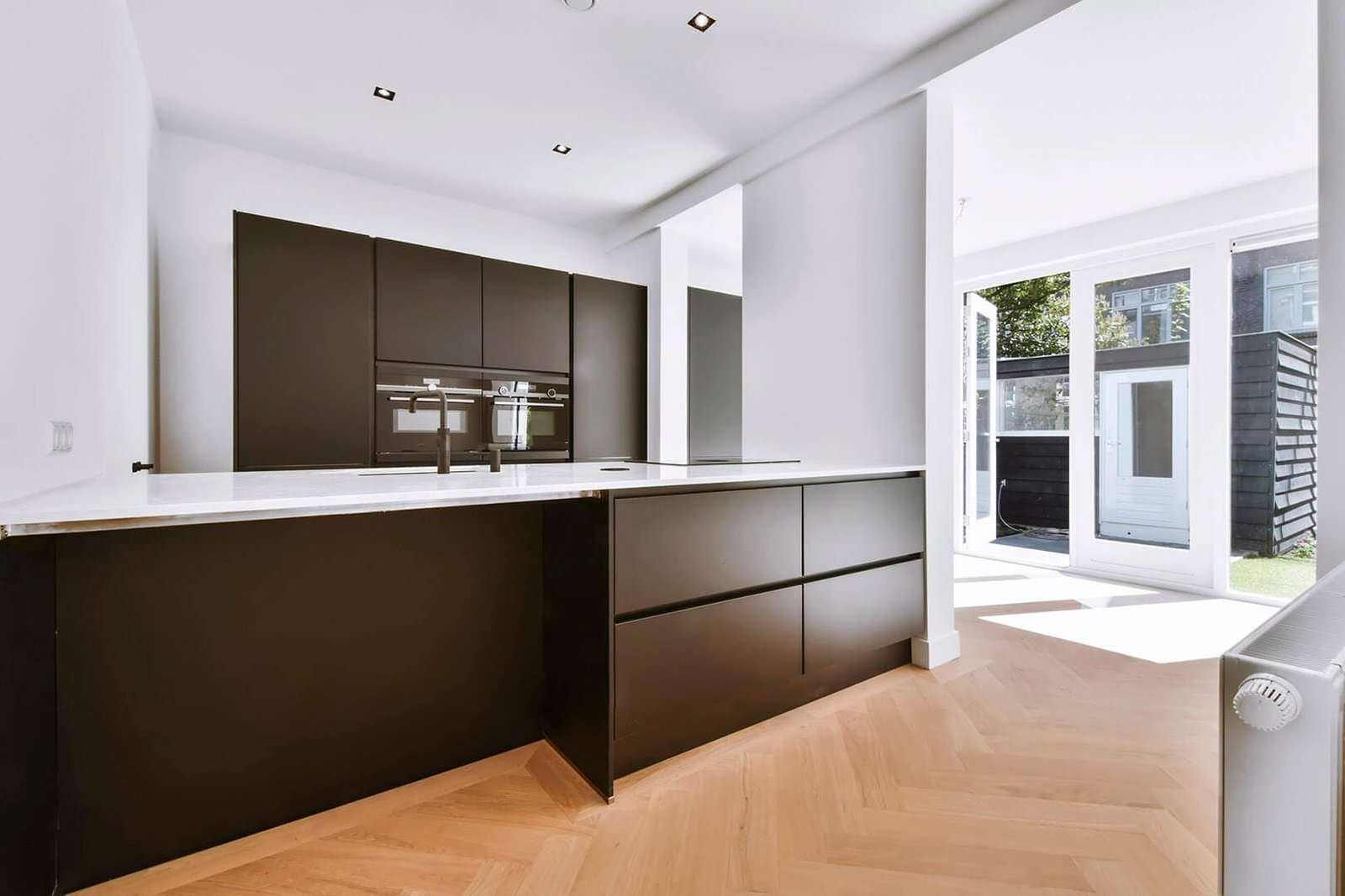 stylish-kitchen-in-daylight-with-a-black-kitchen.jpg